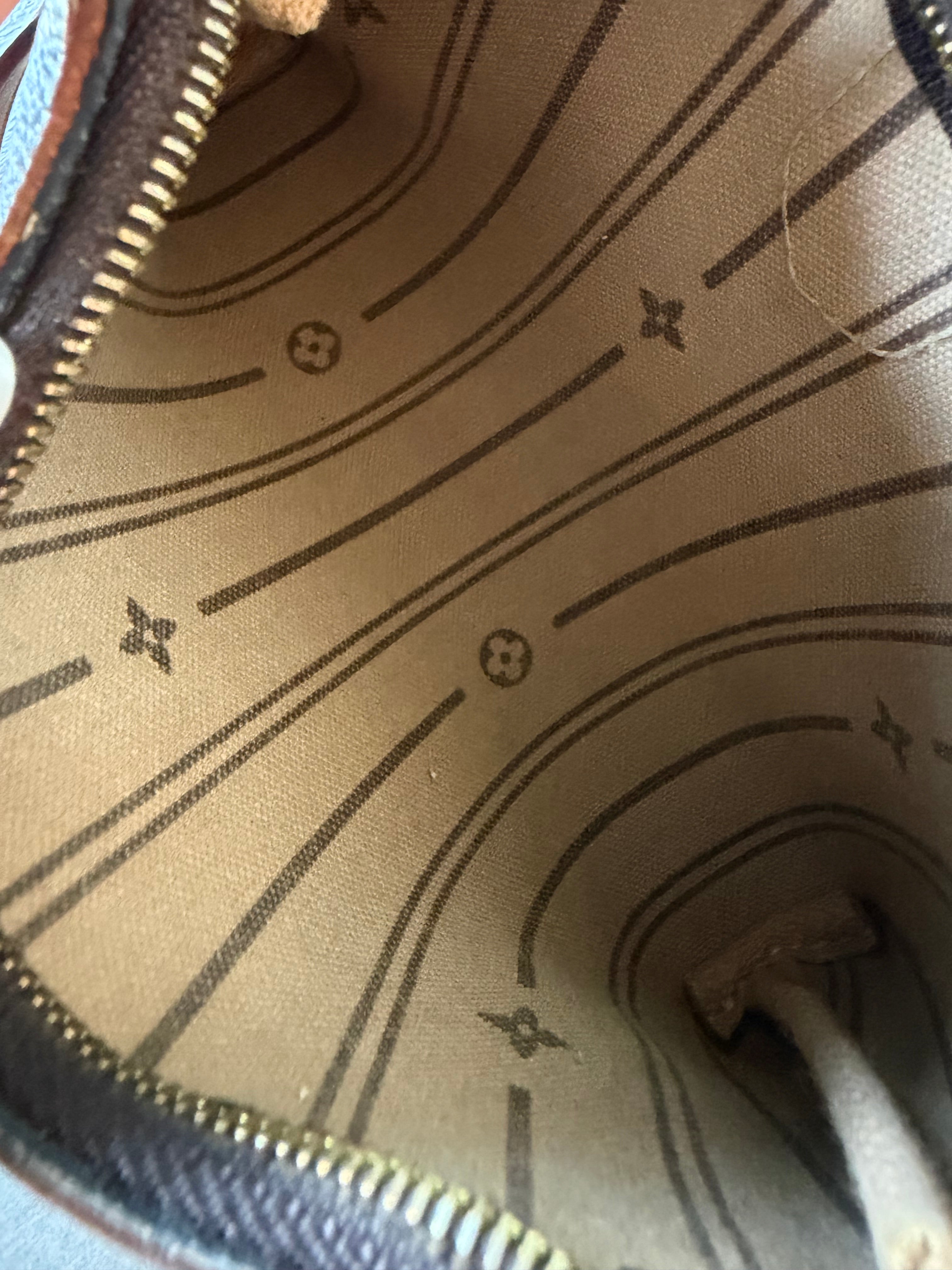 Pochette Louis Vuitton delightful