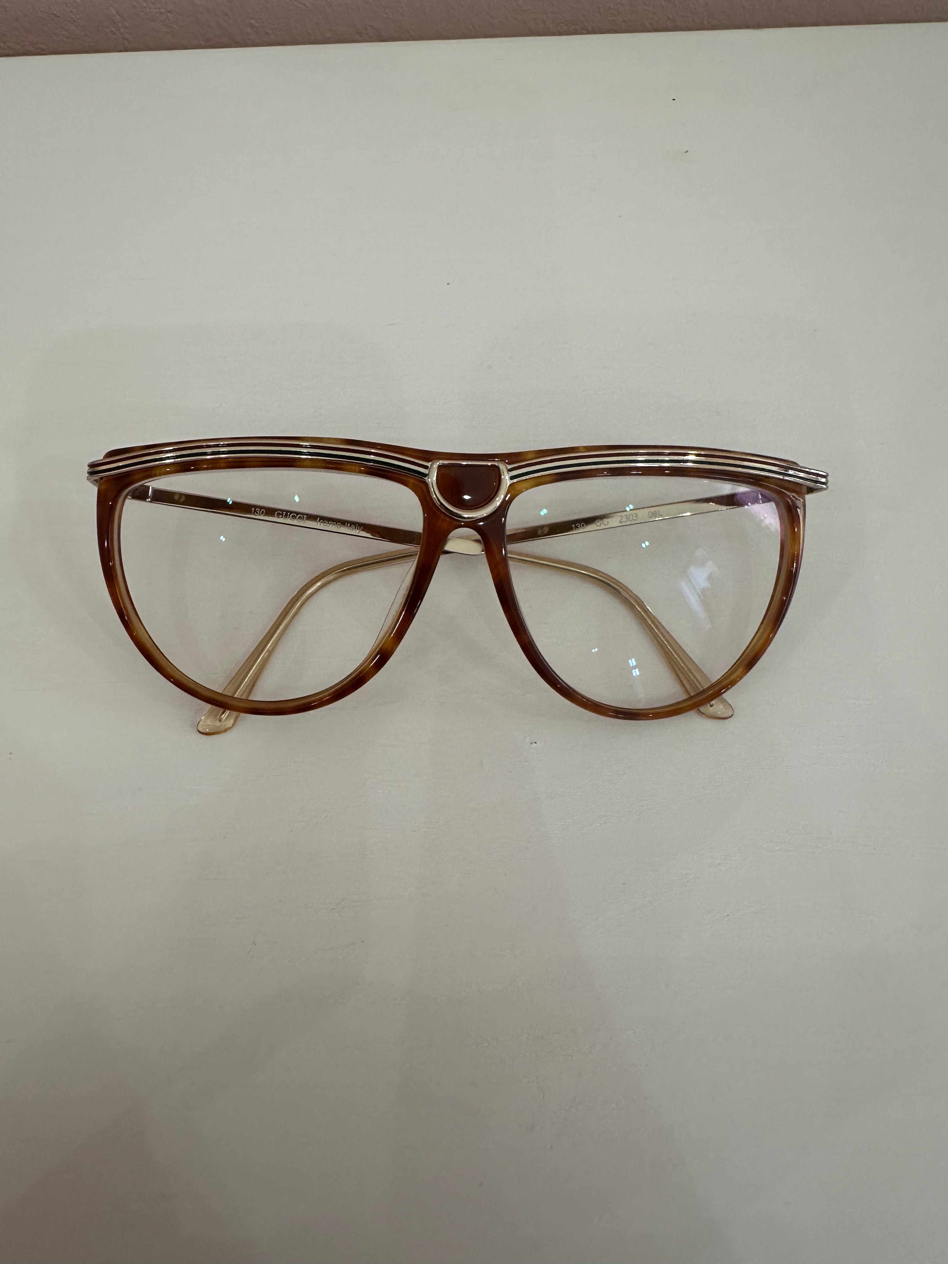 Occhiali Gucci vintage tartarugati, aste oro motivo web