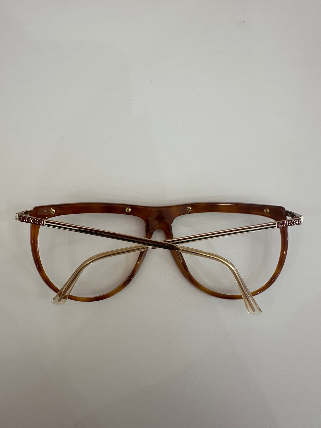 Occhiali Gucci vintage tartarugati, aste oro motivo web