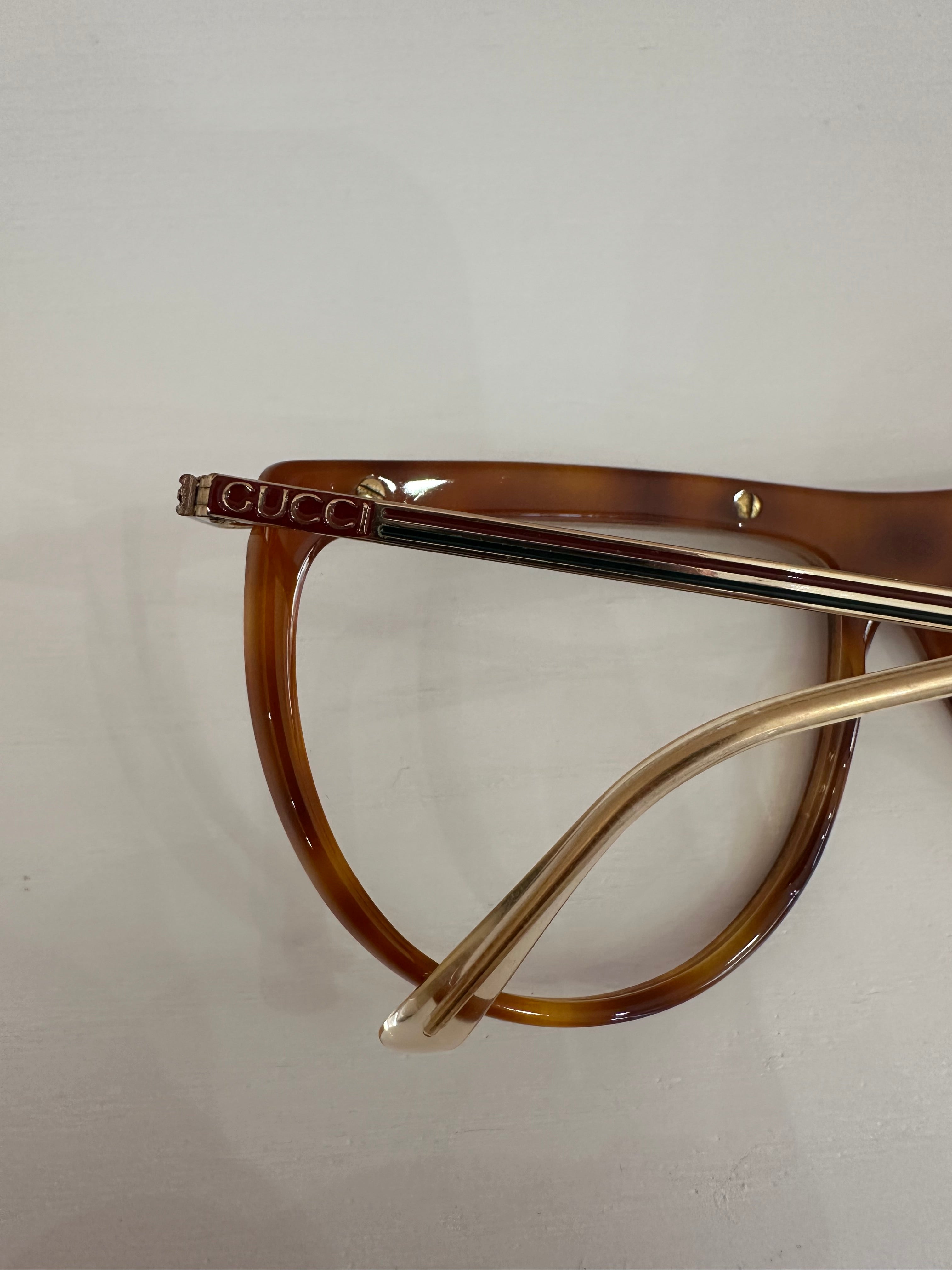 Occhiali Gucci vintage tartarugati, aste oro motivo web