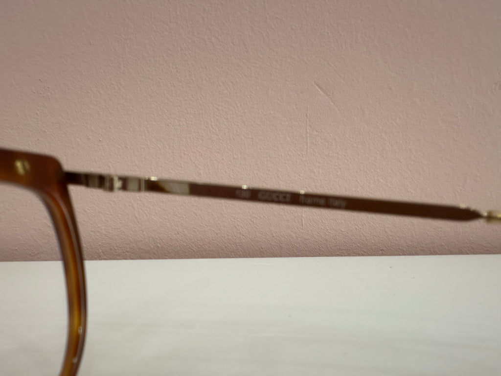 Occhiali Gucci vintage tartarugati, aste oro motivo web