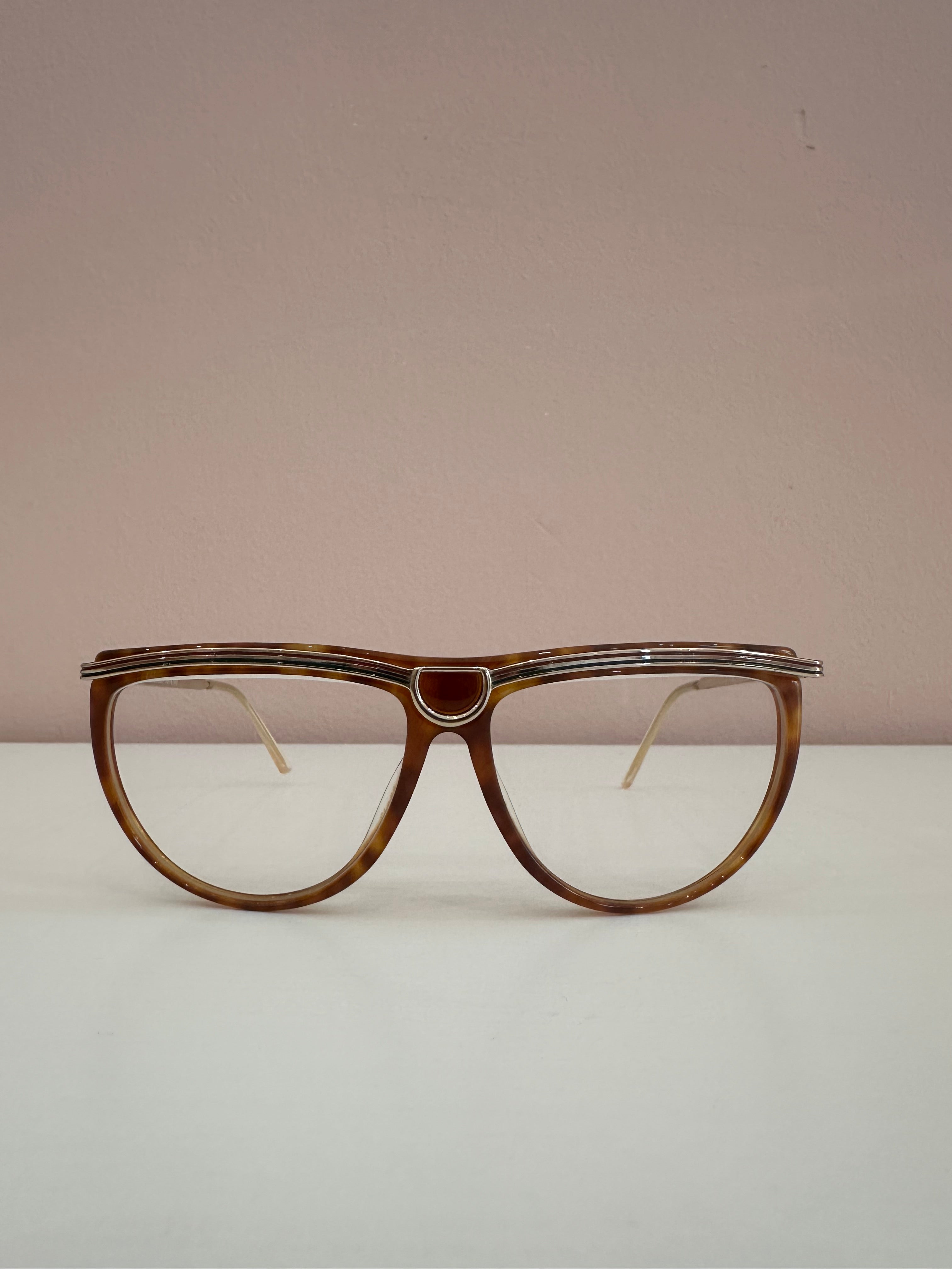 Occhiali Gucci vintage tartarugati, aste oro motivo web