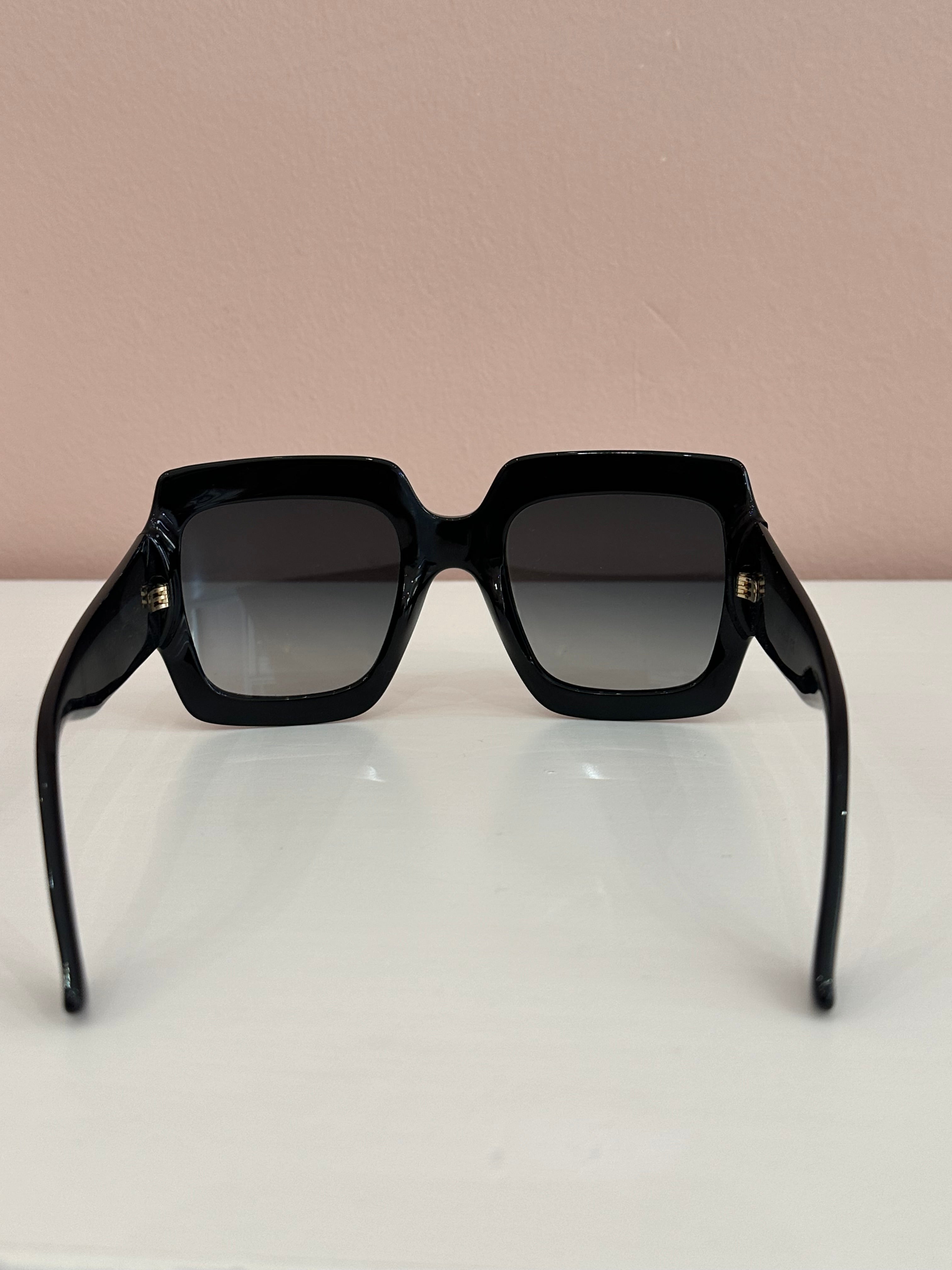 Occhiali da sole Gucci logo interlocking neri