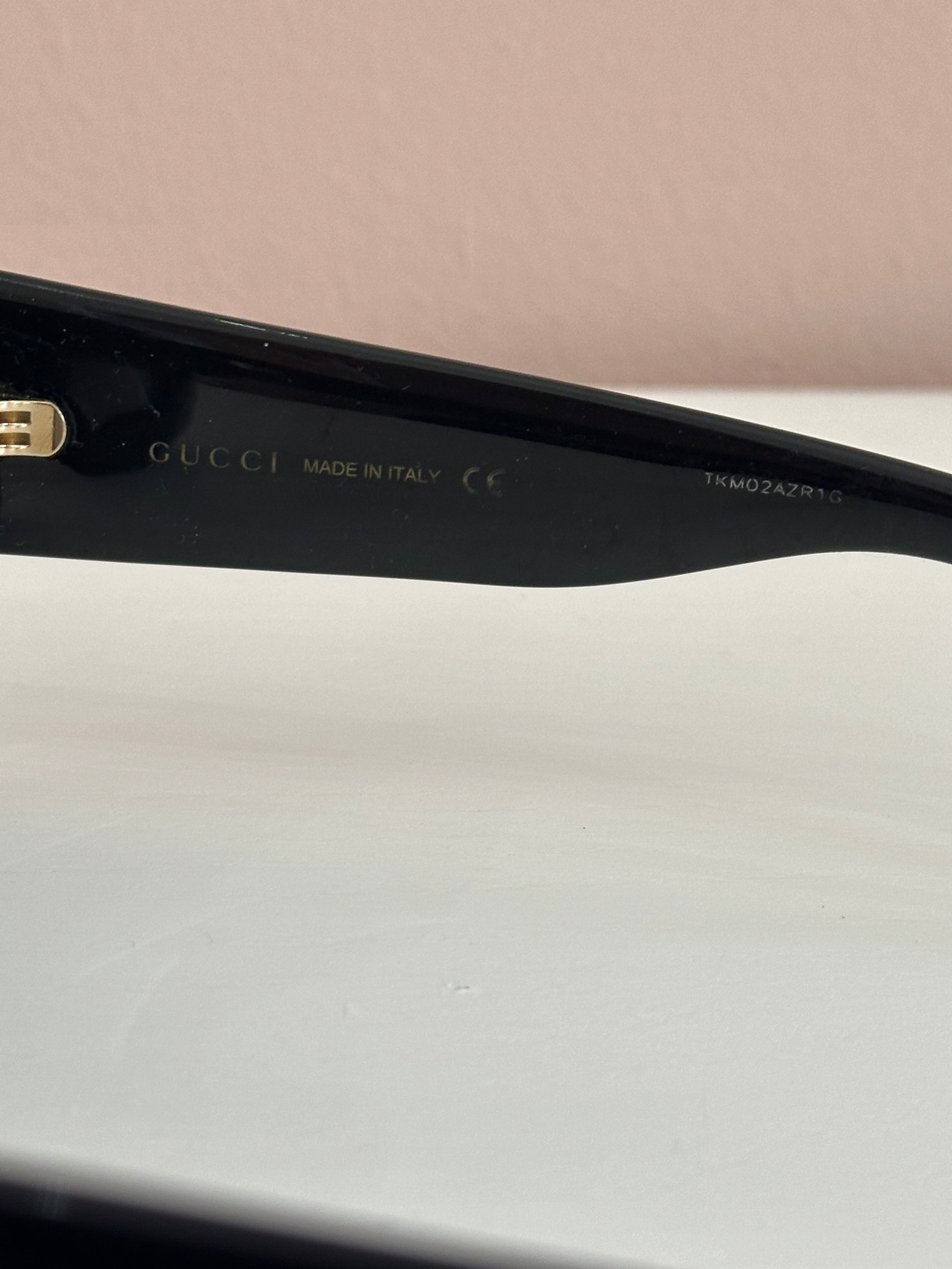 Occhiali da sole Gucci logo interlocking neri